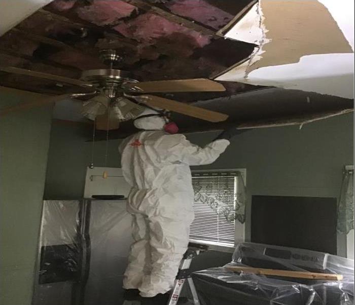 insulation in ceiling exposed due to water damage